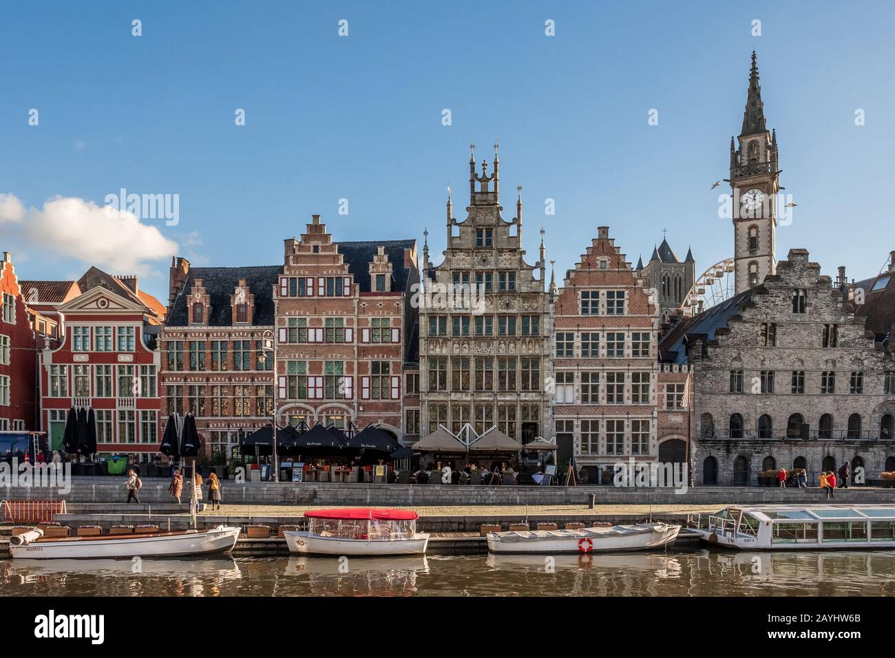 A riverside view of Ghent on a glorious blue sky day Stock Photo