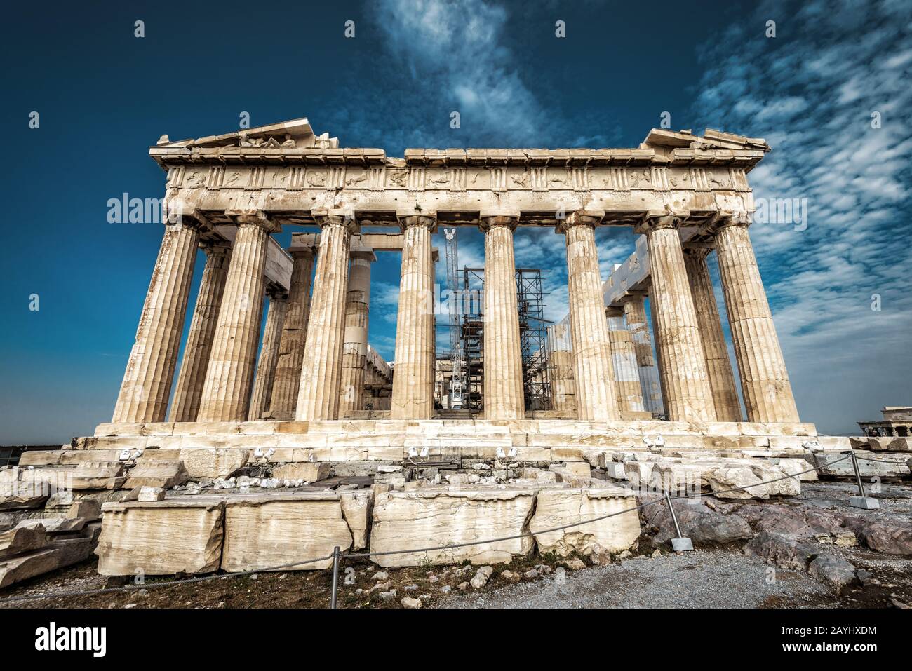 Parthenon on the Acropolis of Athens, Greece. This ancient Greek temple is a main landmark of Athens. Nice view of Parthenon ruins at the top of hill. Stock Photo