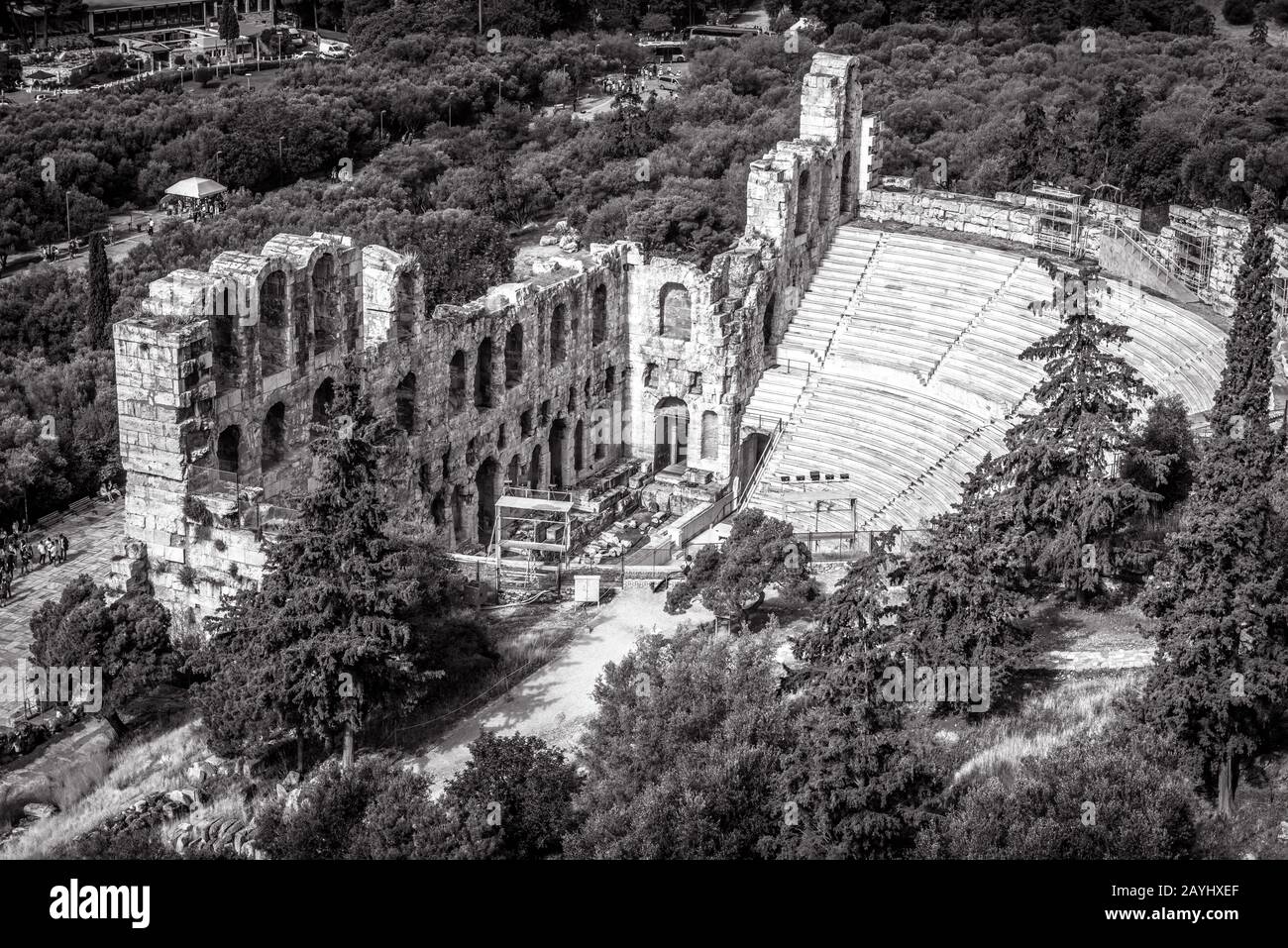 Odeon of Herodes Atticus at Acropolis in black and white, Athens, Greece. It is a famous landmark of Athens. Landscape with antique amphitheater. Pano Stock Photo