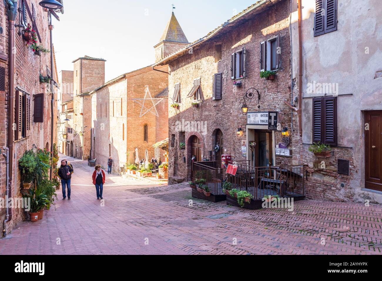 Certaldo, Tuscany, Italy - December 2019: View of the main cobbled street in the medieval town of Certaldo, Tuscany, Italy Stock Photo