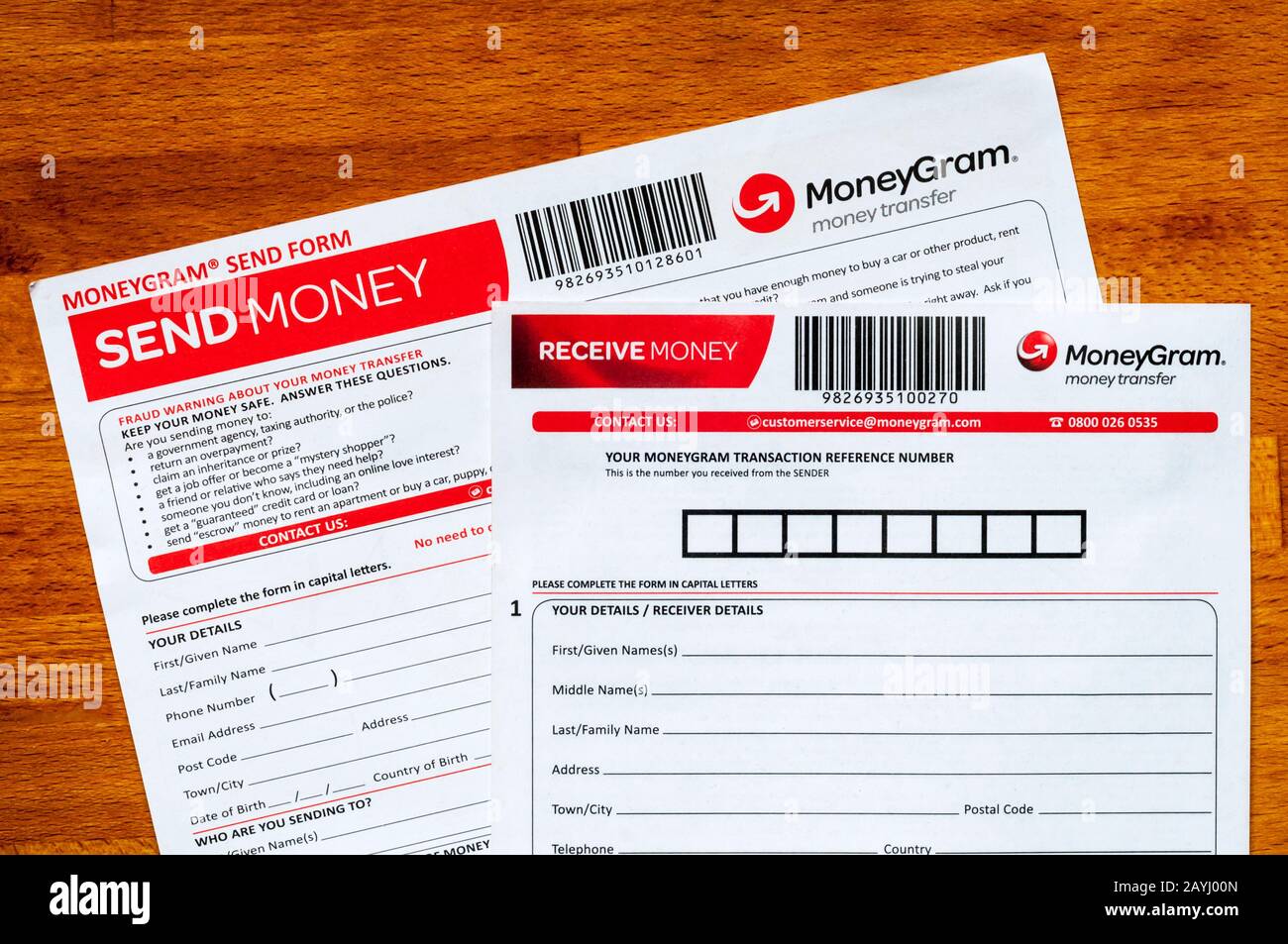 MoneyGram money transfer Send Money and Receive money forms. Stock Photo