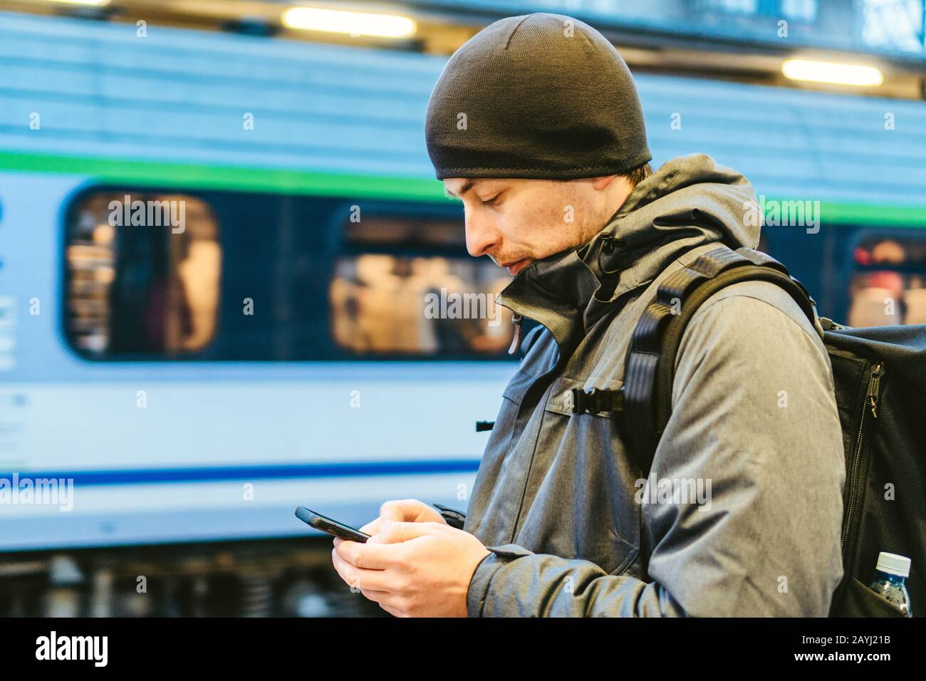Sopot Railway station. traveler waiting for transportation. Travel concept. Man at the train station. Portrait Caucasian Male In Railway Train Station Stock Photo