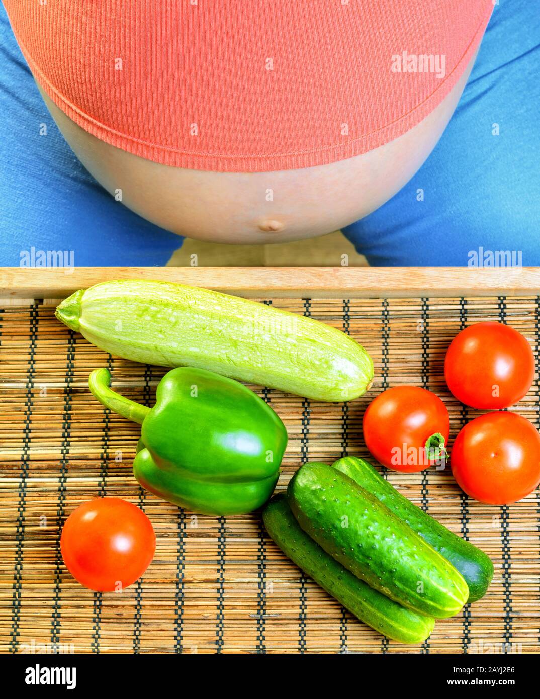 Pregnant woman with vegetables Stock Photo - Alamy
