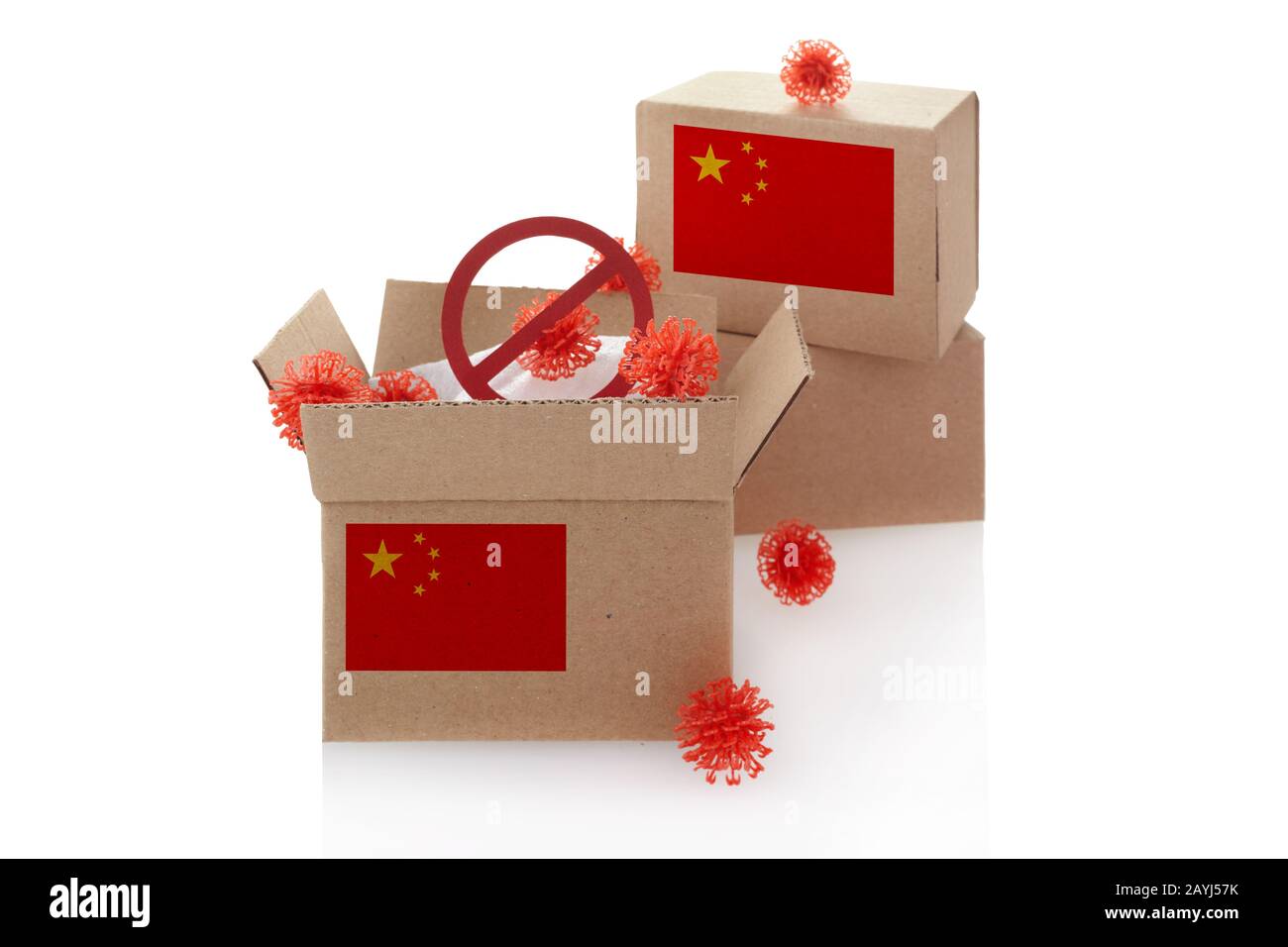 Coronavirus infected parcels from China. Red bacteria cells in boxes. Wuhan flu affecting international postal. Stock Photo