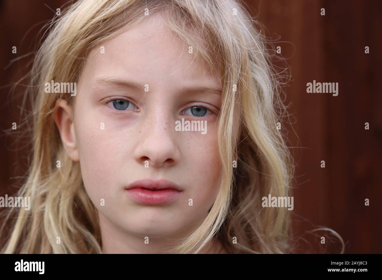 Portrait of a young teenage girl with a serious stare Stock Photo