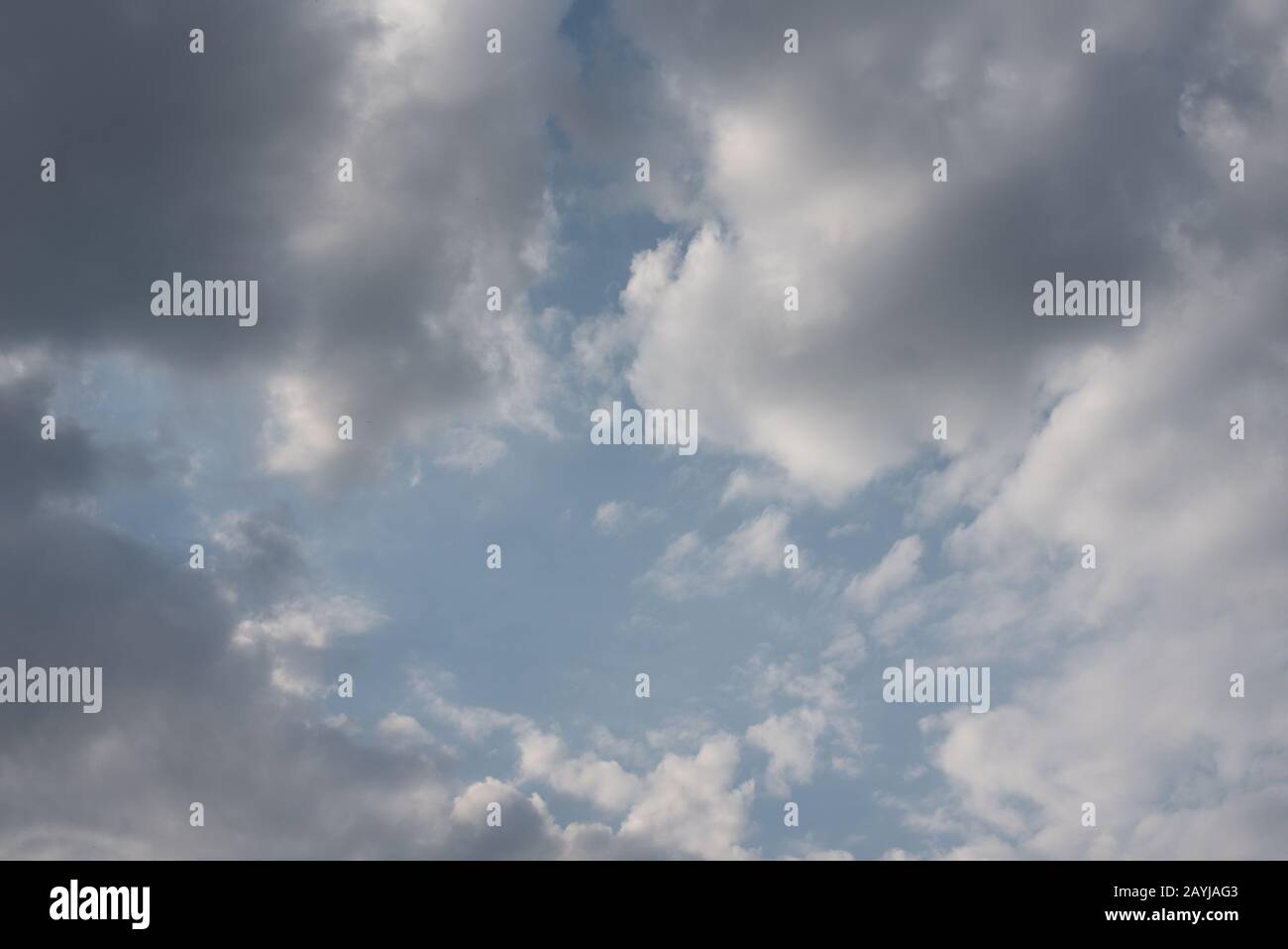 White clouds in blue summer sky background Stock Photo - Alamy