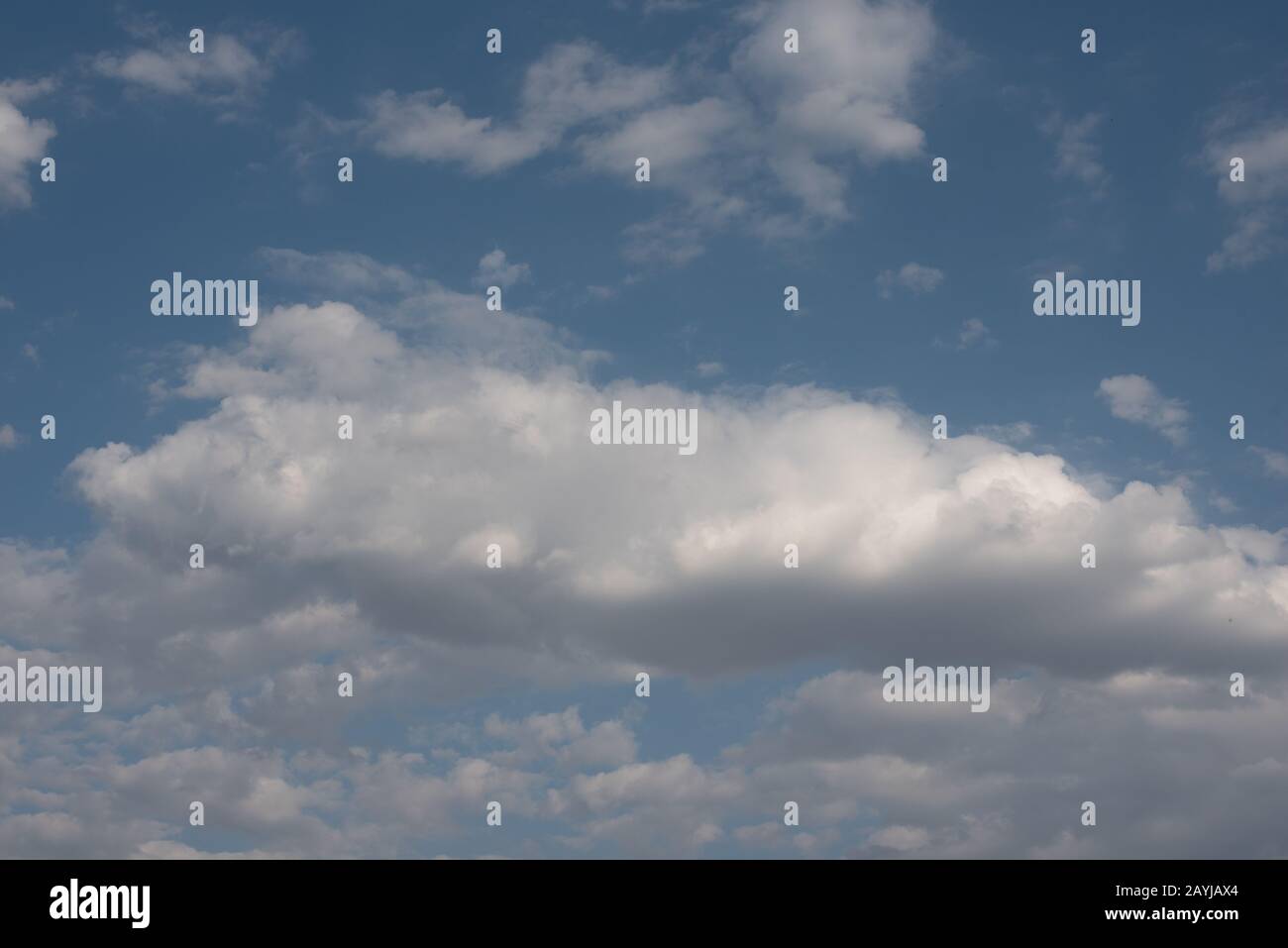 White clouds in blue summer sky background Stock Photo - Alamy