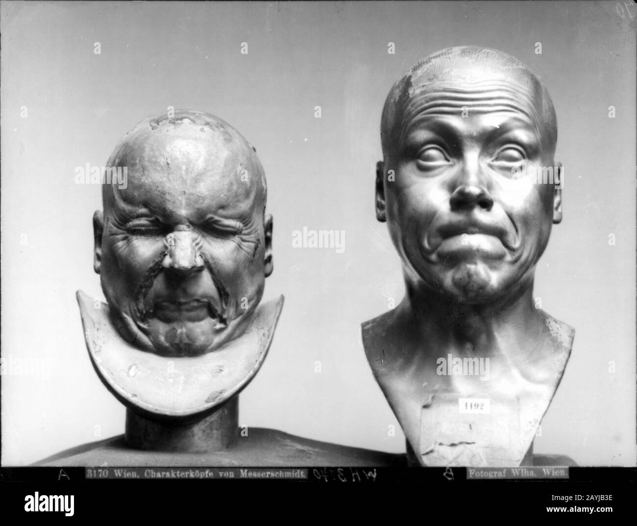 Franz Xaver Messerschmidt - Character heads No. 24 and No. 28 (Josef Wlha, 1906). Stock Photo
