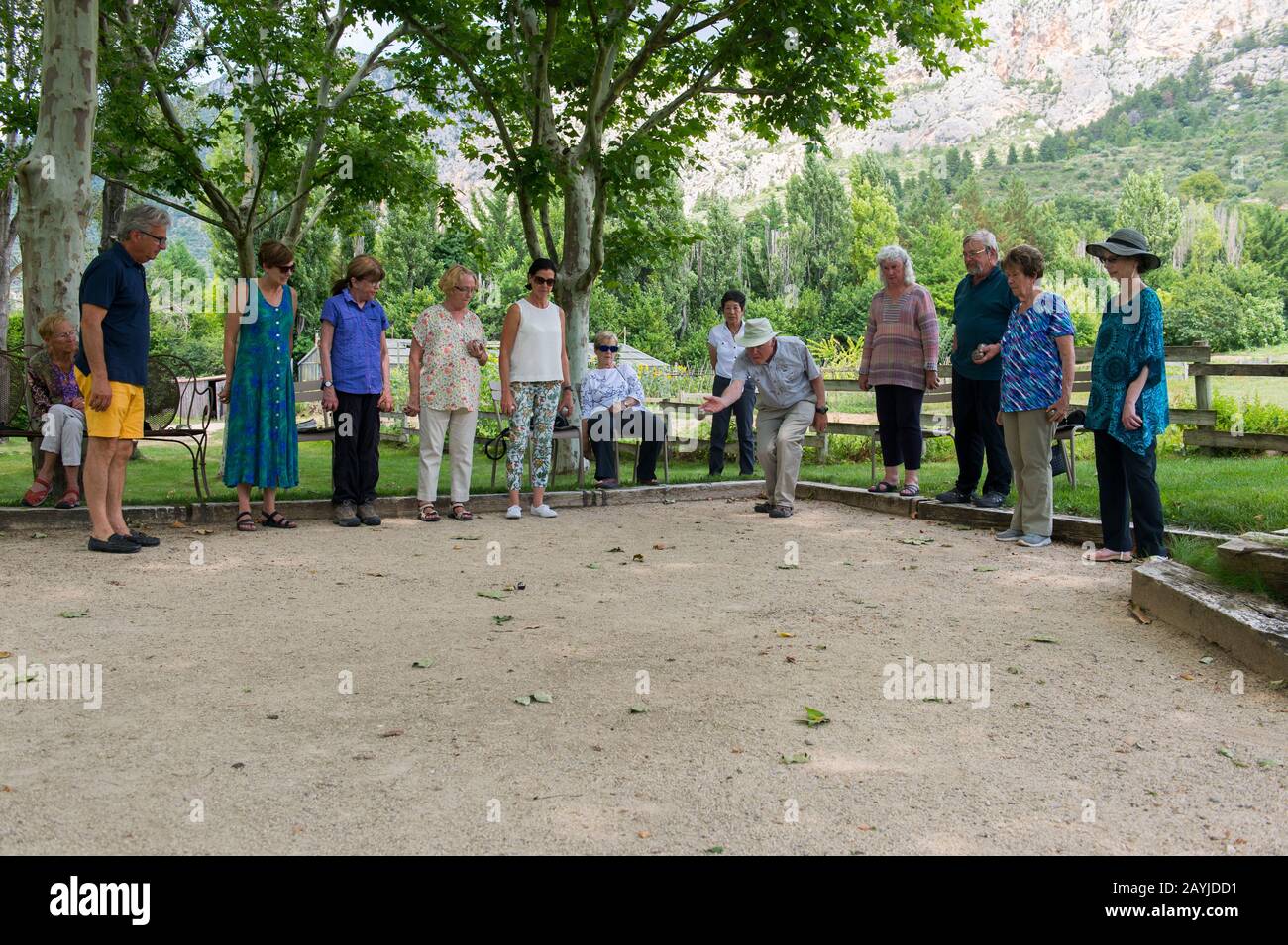 The photo tour members (Run with the Wolfies) enjoying a game of Petanque ( boules sport) in the garden at La Bastide de Moustiers, a house converted t  Stock Photo - Alamy