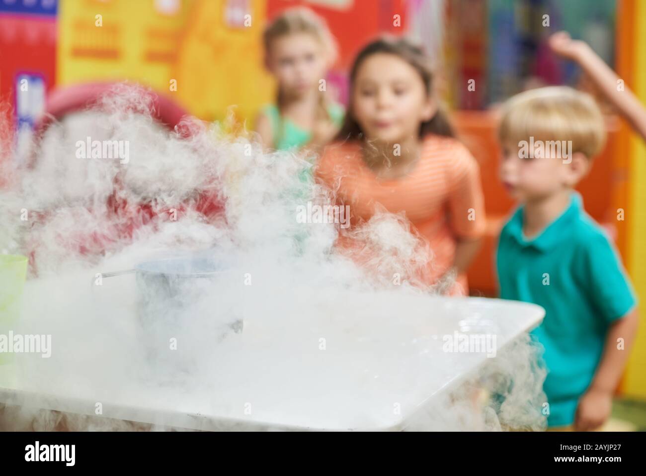 Experiment with dry ice at kids Birthday party Stock Photo Alamy
