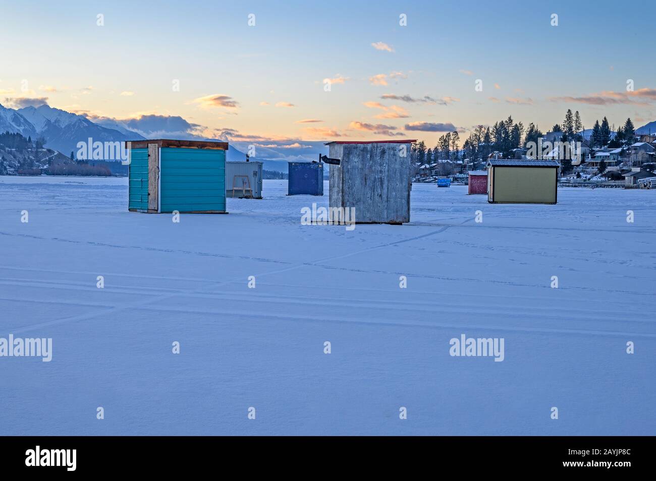 Ice fishing shacks on Lake Windermere at the town of Invermere, British Columbia, Canada Stock Photo