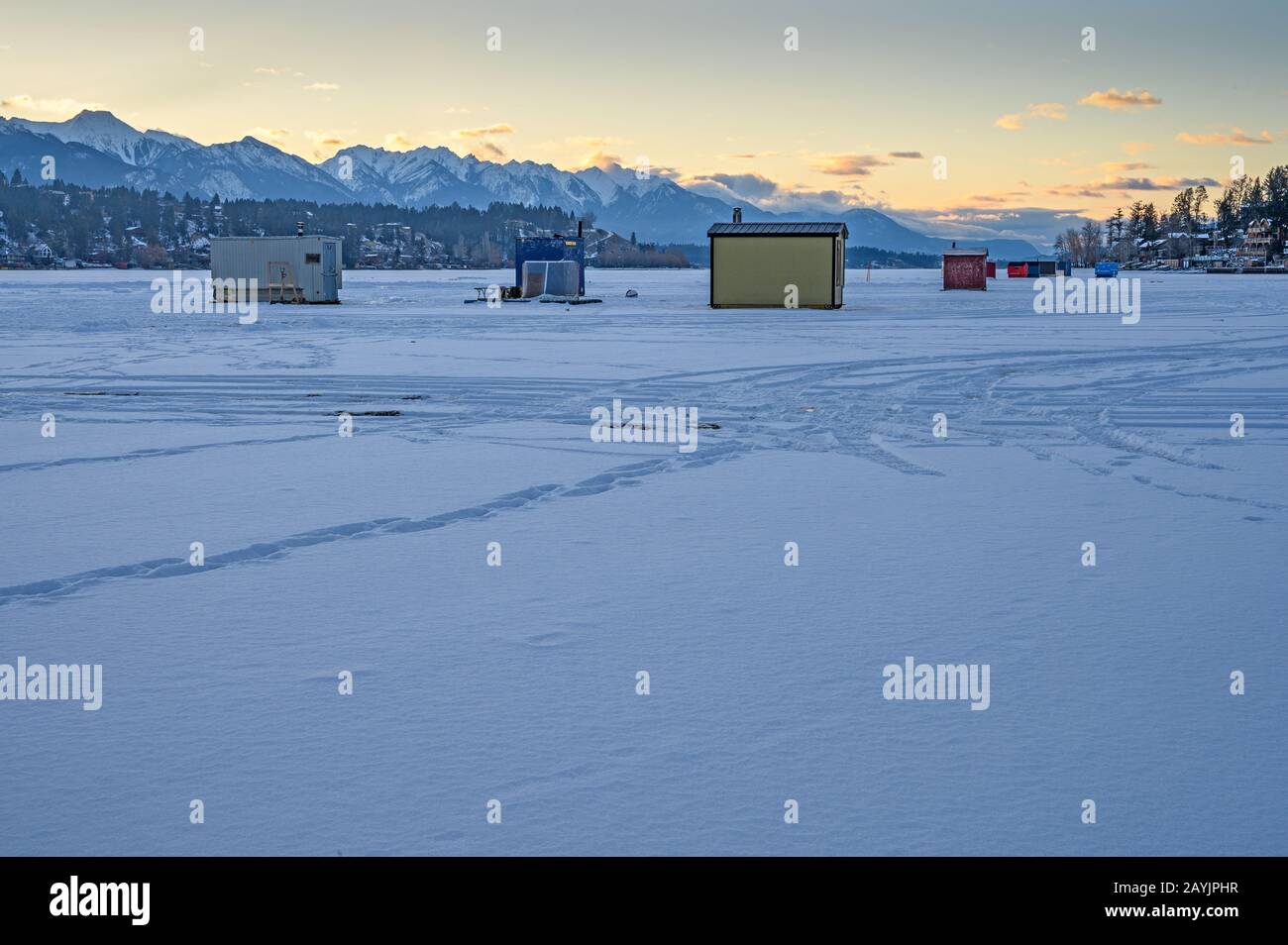 Ice fishing shacks on Lake Windermere at the town of Invermere, British Columbia, Canada Stock Photo