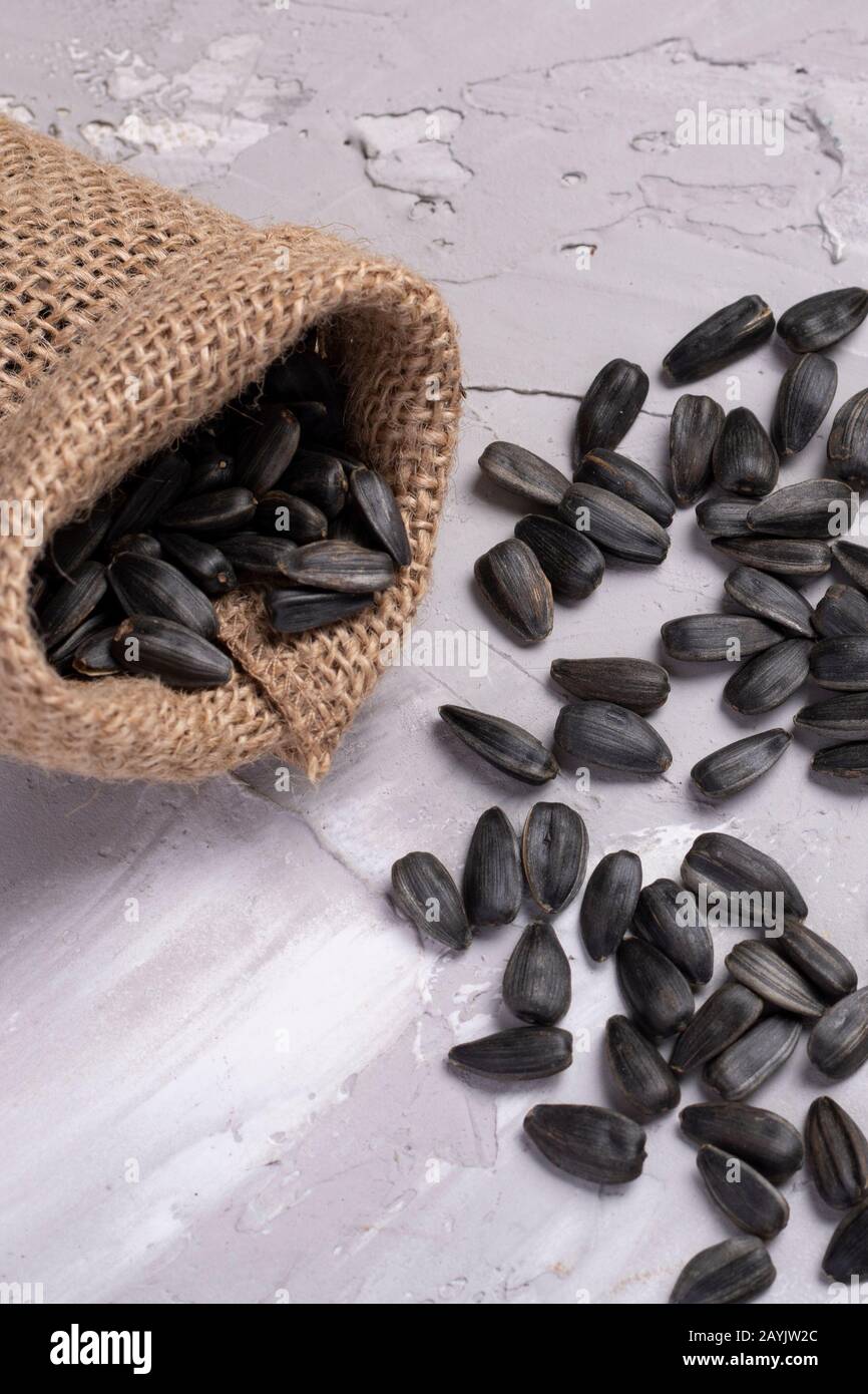 Burlap sacks with sunflower seeds Stock Photo