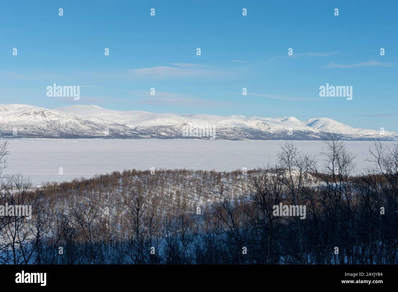 View of frozen and snowcovered Lake from crosscountry ski