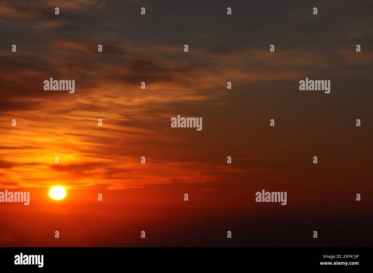 Beautiful sunset sky with clouds background Stock Photo - Alamy
