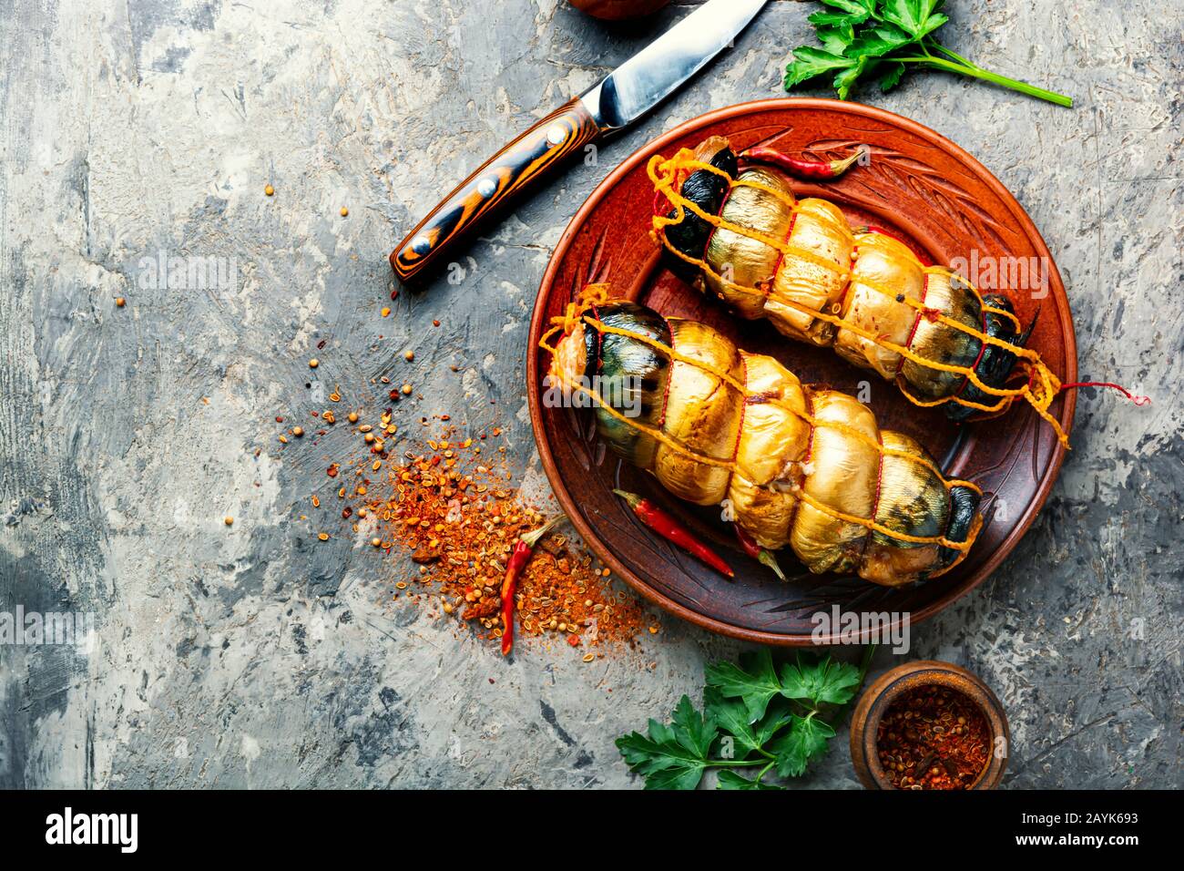 Appetizing fish roll made from smoked mackerel. Stock Photo