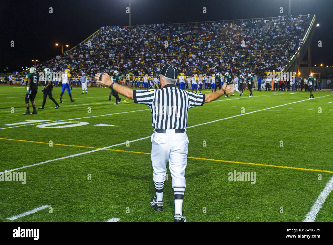 Miami Florida,Miami Dade College North Campus,Traz Powell Stadium,high school football playoff game,Northwestern vs. Central,referee,official,striped Stock Photo