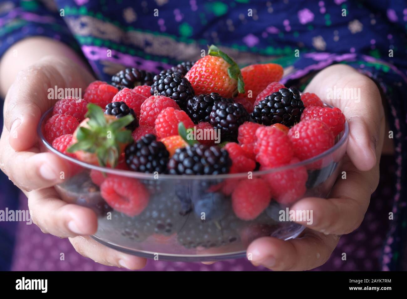 close up of fresh berry fruit in a bowl,  Stock Photo