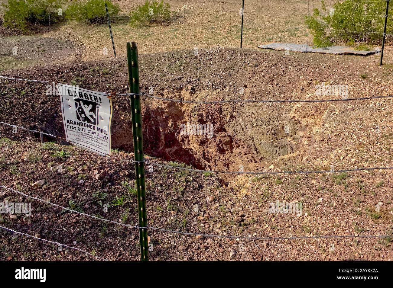 An abandoned mine that has been fenced off by the Arizona State Mine Inspector. It currently resides on federal BLM land so no property release is nec Stock Photo