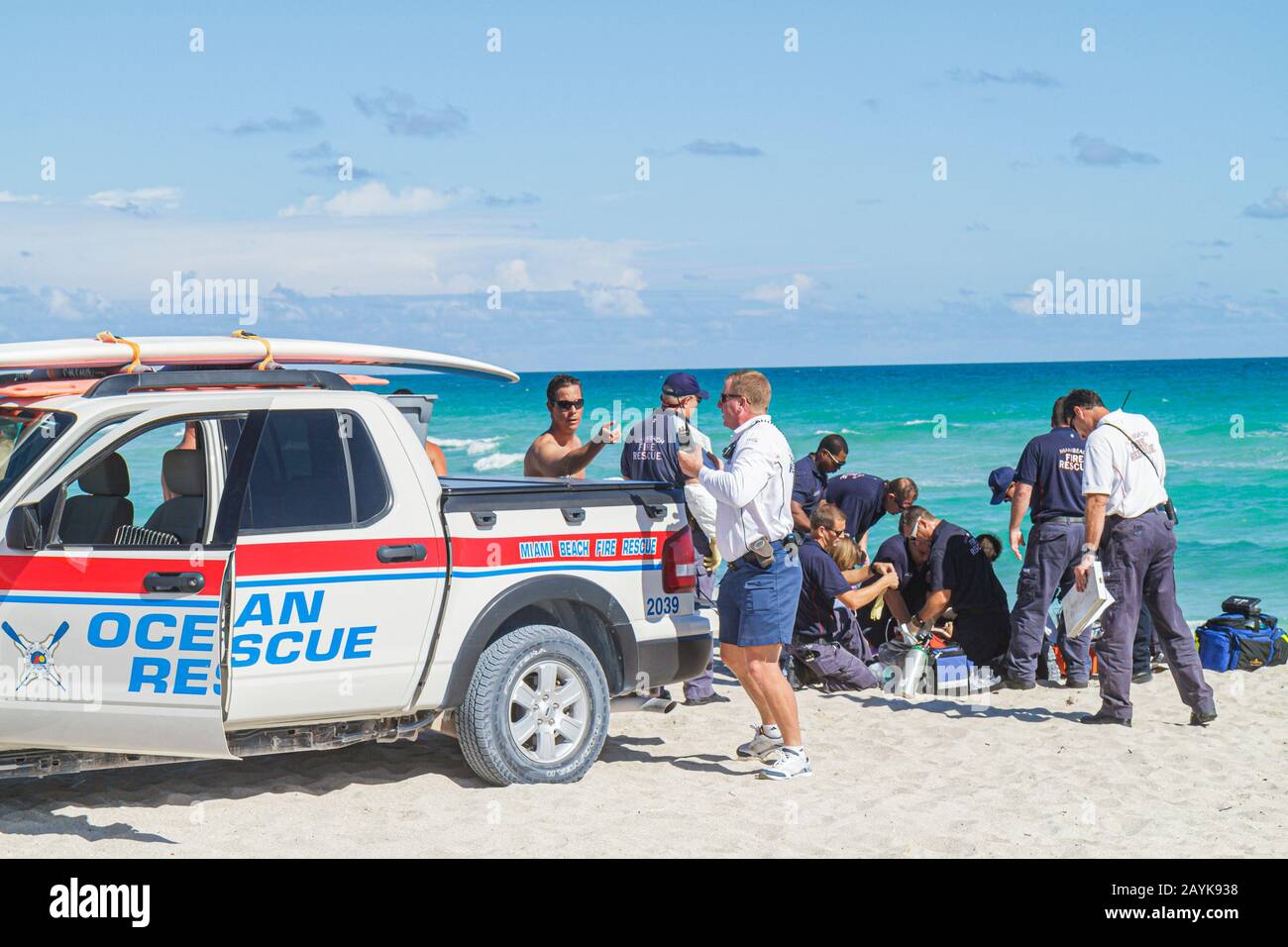 Miami Beach Florida,Atlantic Ocean,water,fire rescue,emergency,CPR,cardiopulmonary resuscitation,drowning,victim,rough surf,rip currents EMC,medics,FL Stock Photo
