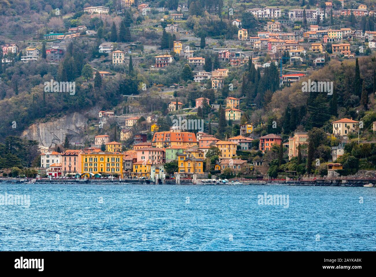 Evening view city Bellagio and Varenna Como water lake Italy blue sky mountain Stock Photo