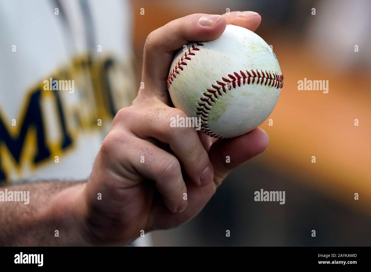 A pitcher shows off baseball grips for throwing Stock Photo Alamy
