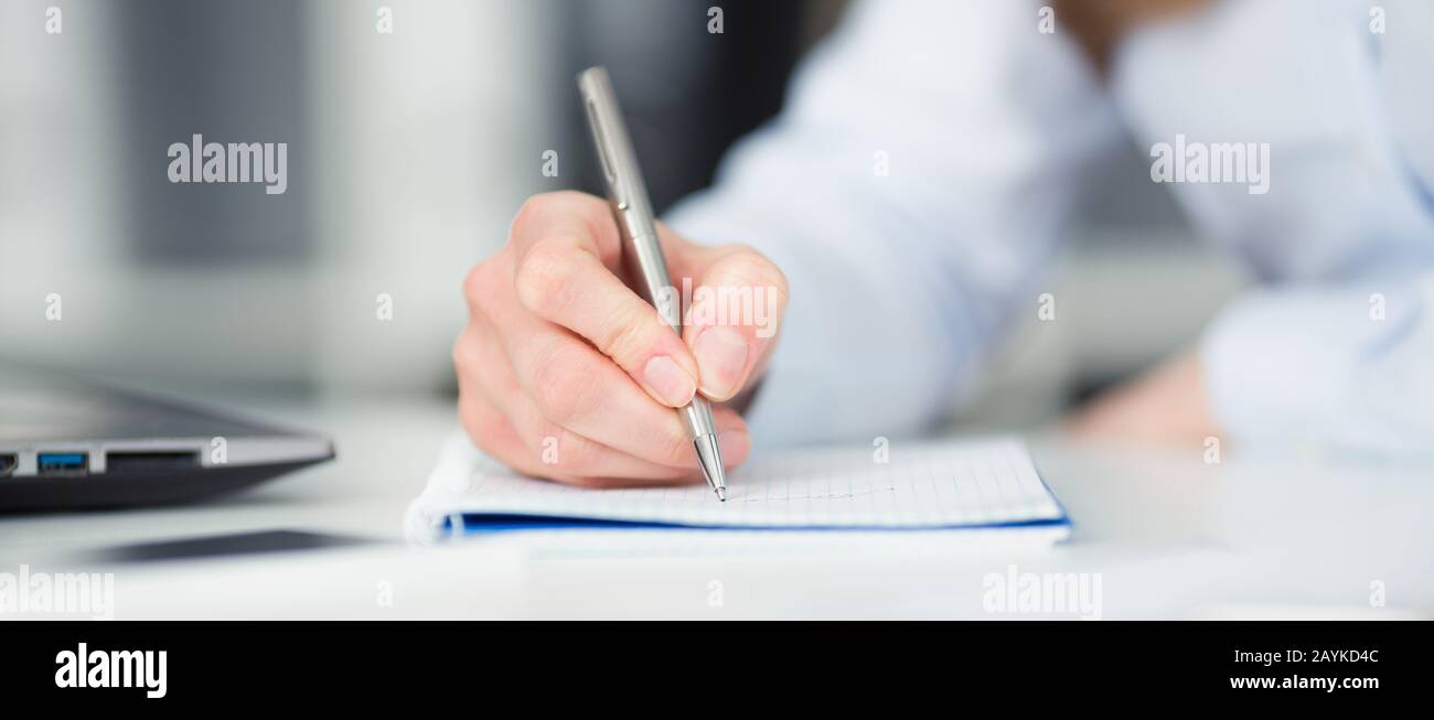 Business concept: signing contracts, notes in a notebook, scheduling ...