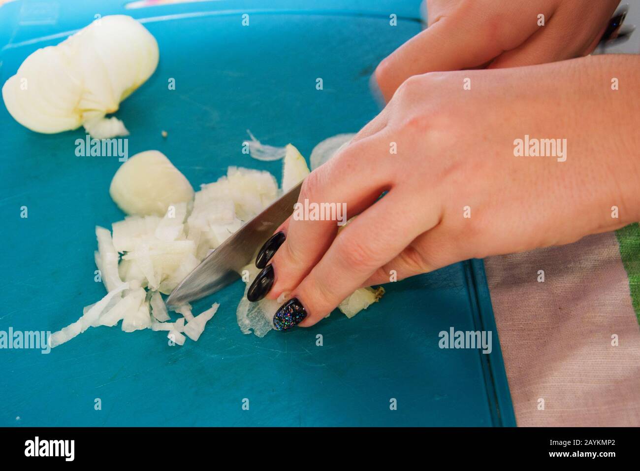 Hand knife cuts green onions hi-res stock photography and images - Alamy