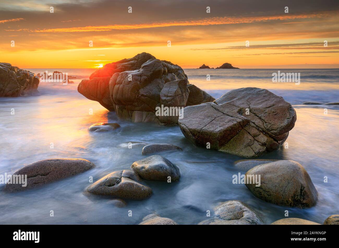 Sunset captured from Porth Nanven cove in Cornwall. Stock Photo