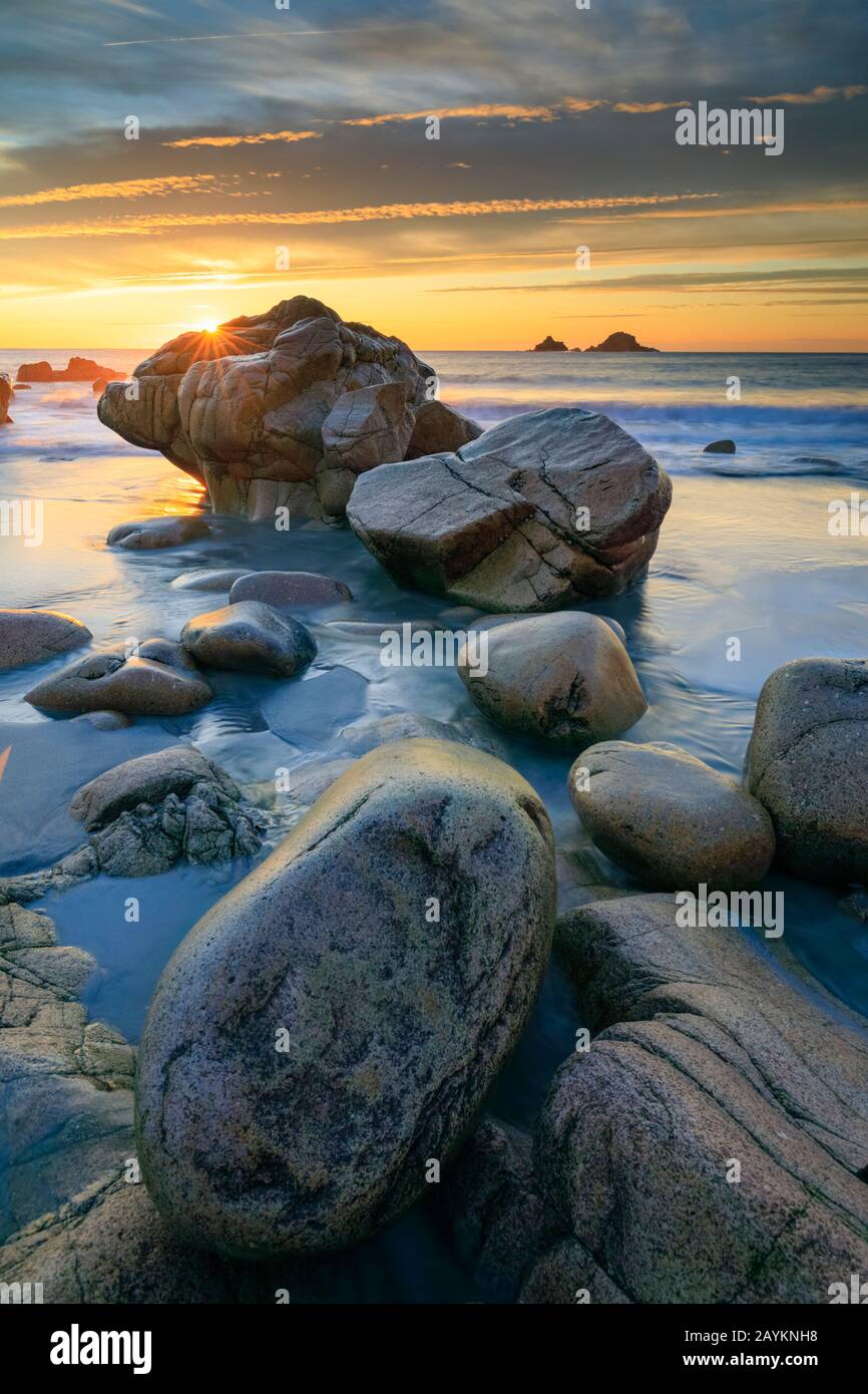 Sunset captured from Porth Nanven cove in Cornwall. Stock Photo