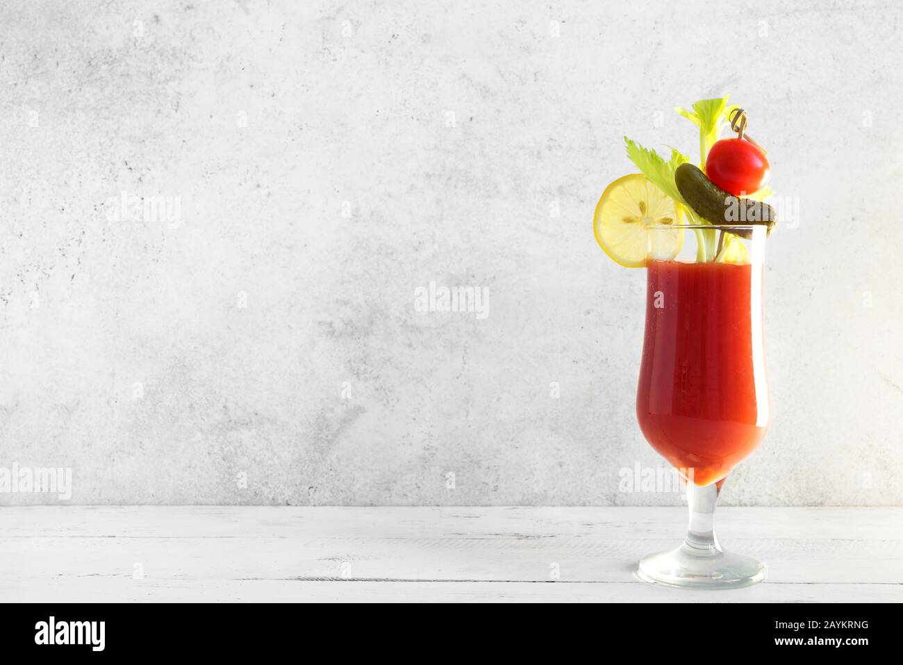 Bloody Mary Cocktail in glass with garnishes. Tomato Bloody Mary or