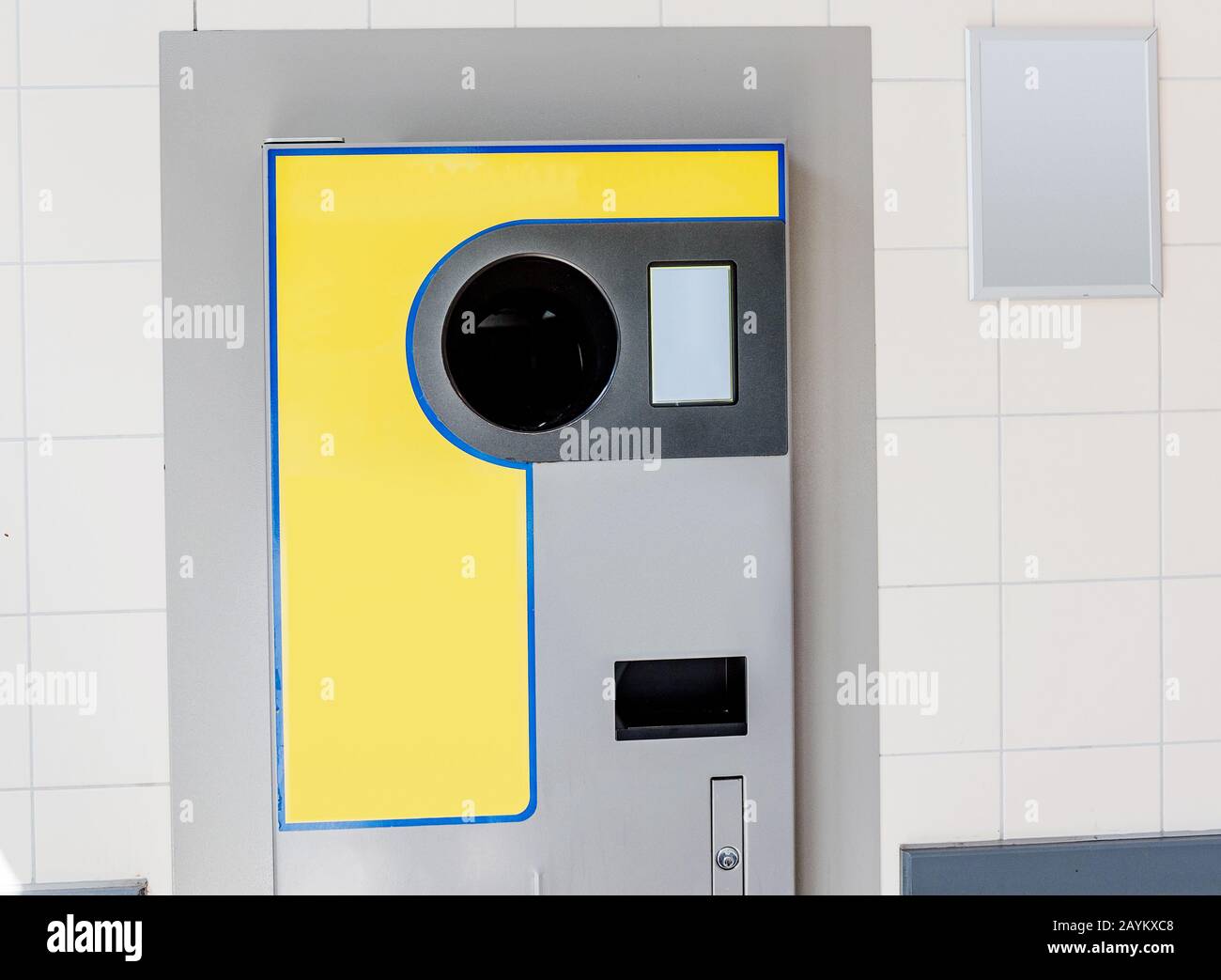 Reverse Vending Machine to receive money from machinery at supermarket, plastic bottles recycle