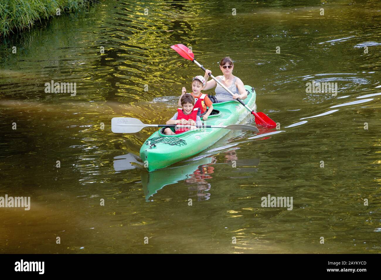 LEIPZIG, GERMANY - MAY 21, 2018: Family on kayaks and canoe acitvity tour  at Elsterflutbett river in Leipzig. Leisure and healthy lifestyle concept  Stock Photo - Alamy