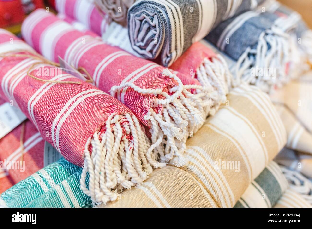 Stack of towels for sale in shop Stock Photo Alamy