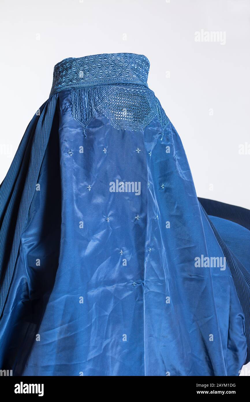 Blue burqa on white background, traditional women's clothing from Afghanistan and Pakistan Stock Photo
