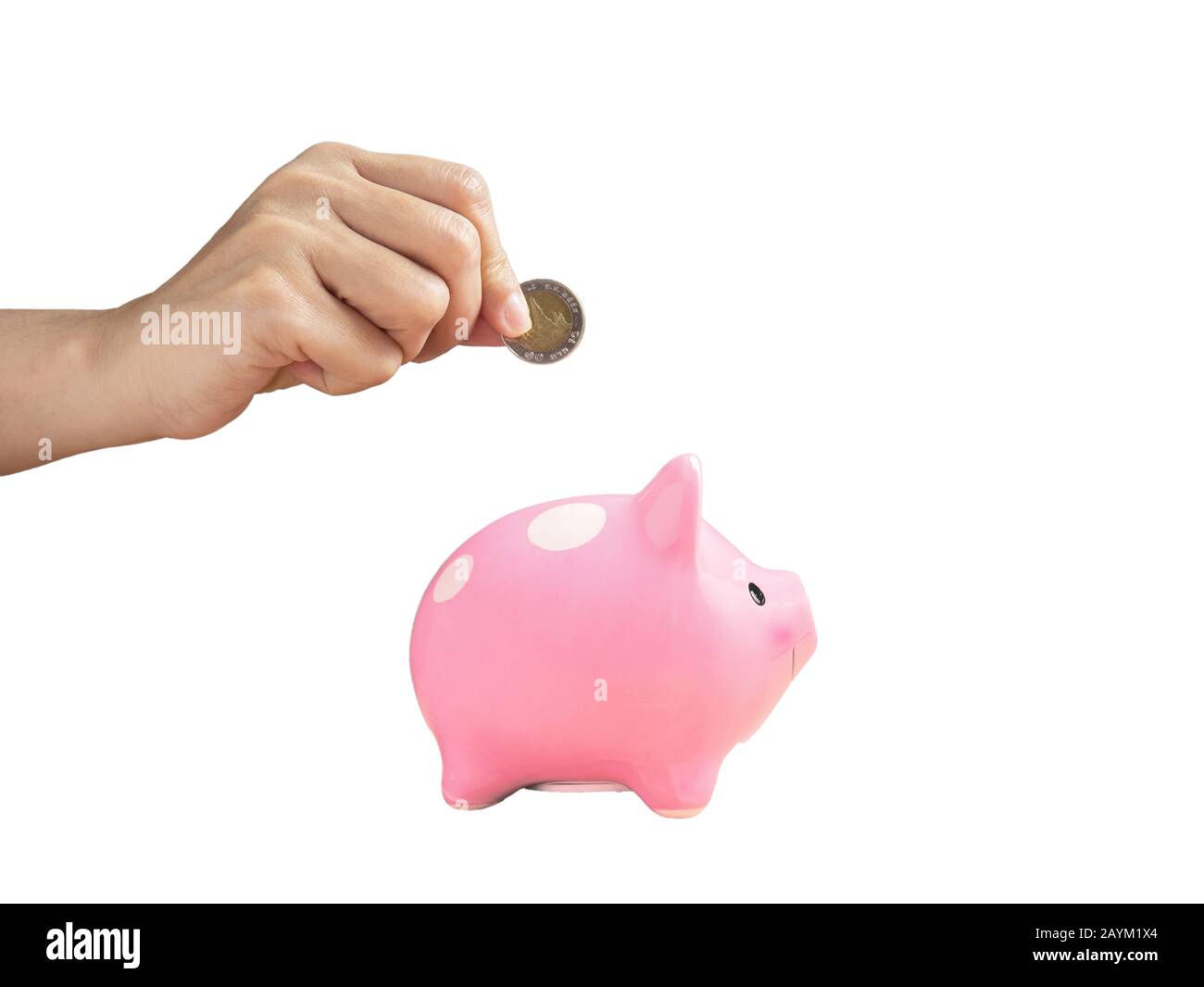 woman putting coin into piggy bank isolated on white background with clipping path. finance and saving money for future concept. Stock Photo
