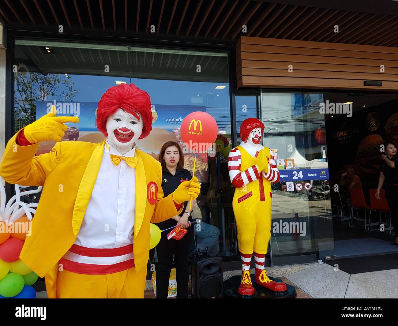 PATTAYA, THAILAND - MARCH 16, 2017 : mascot of Ronald McDonald stand in front of McDonald's shop in Pattaya branch Stock Photo