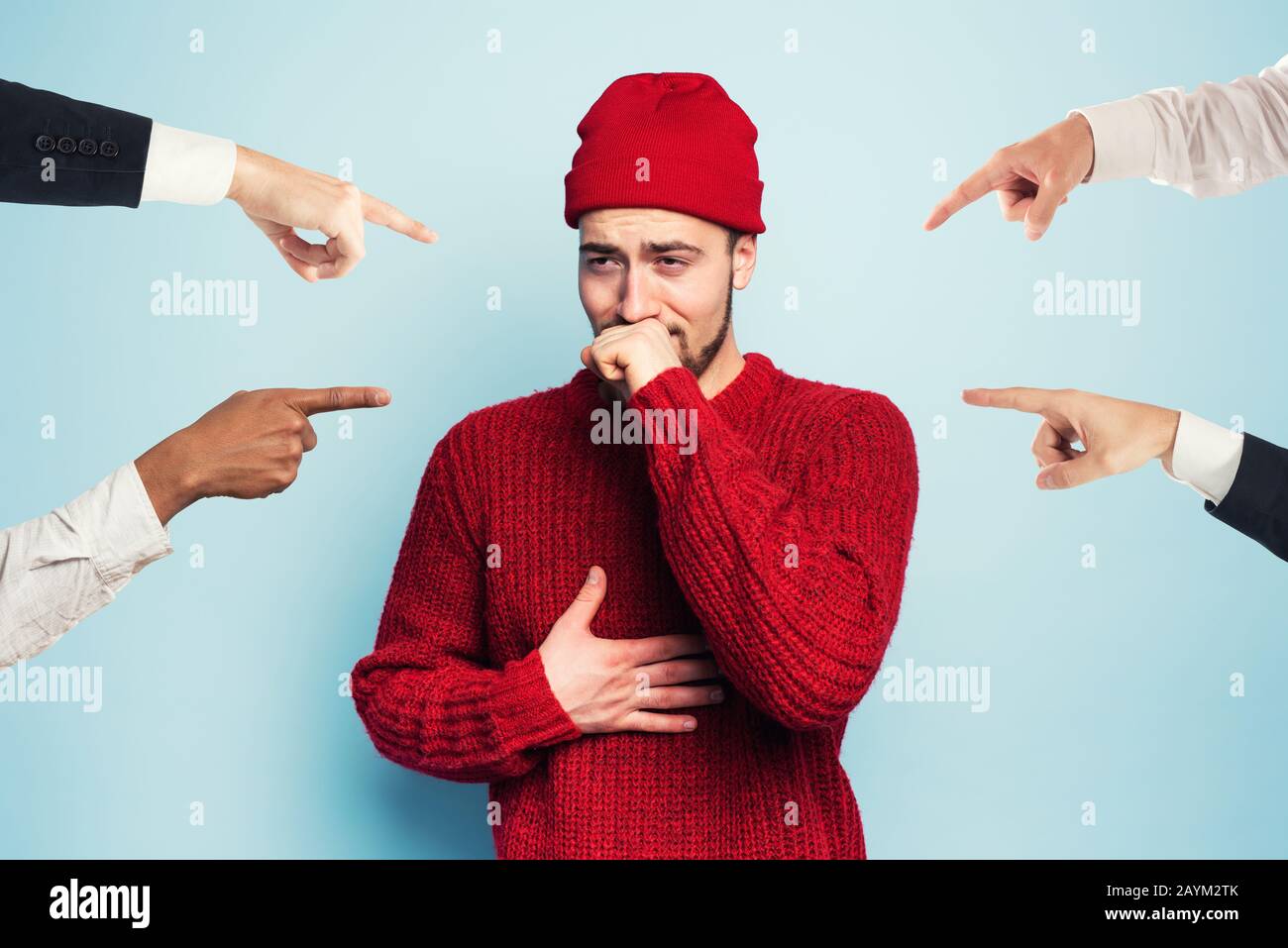 Boy caught a cold is accused of infecting the virus. Studio on Cyan background Stock Photo