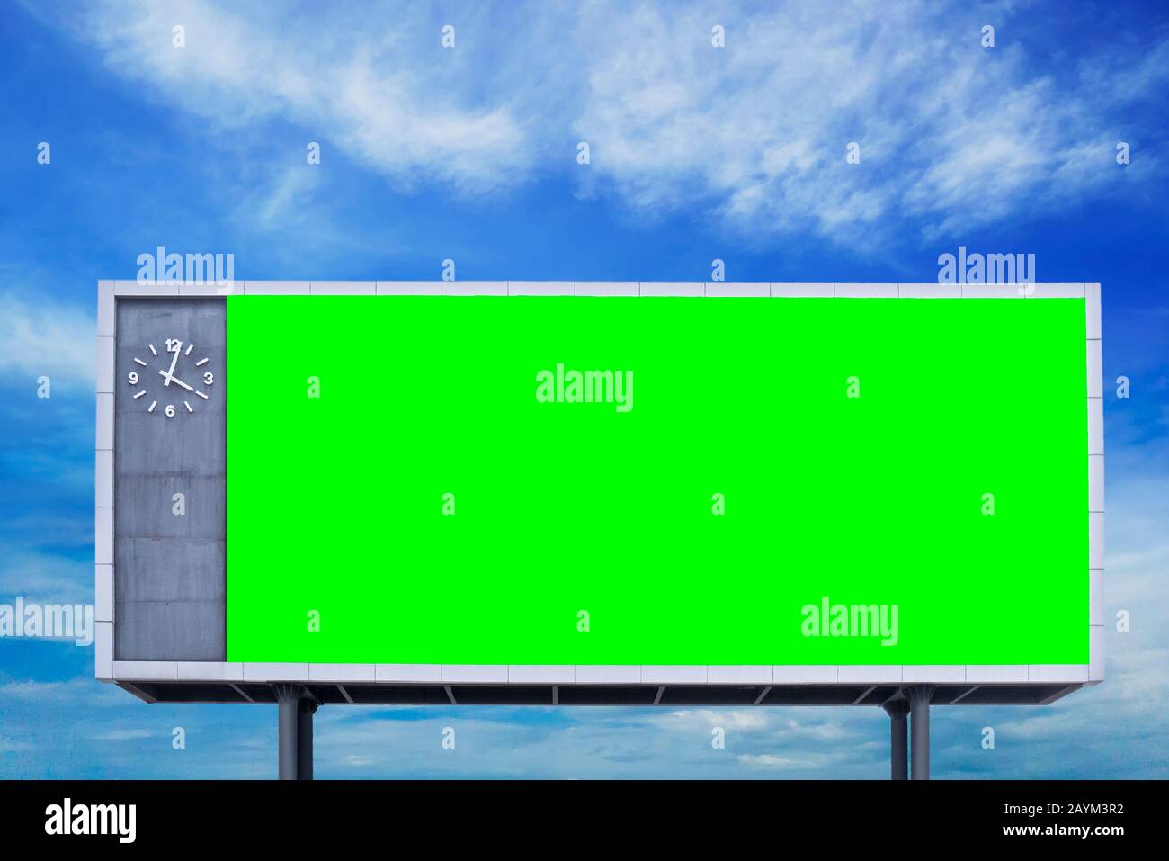 empty blank green screen billboard sign with blue sky at background Stock Photo