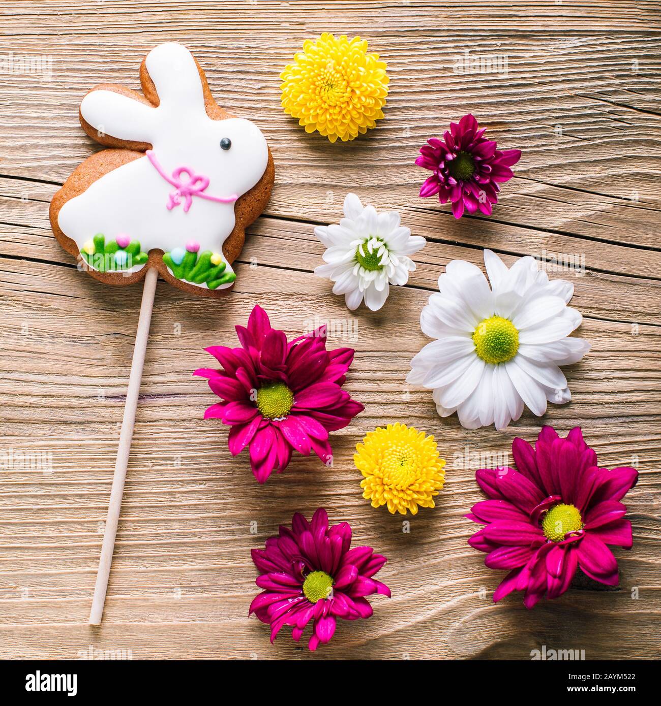 Easter gingerbread rabbit on wooden background Stock Photo