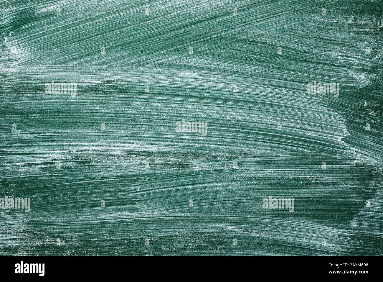 Green blackboard smeared with chalk Stock Photo