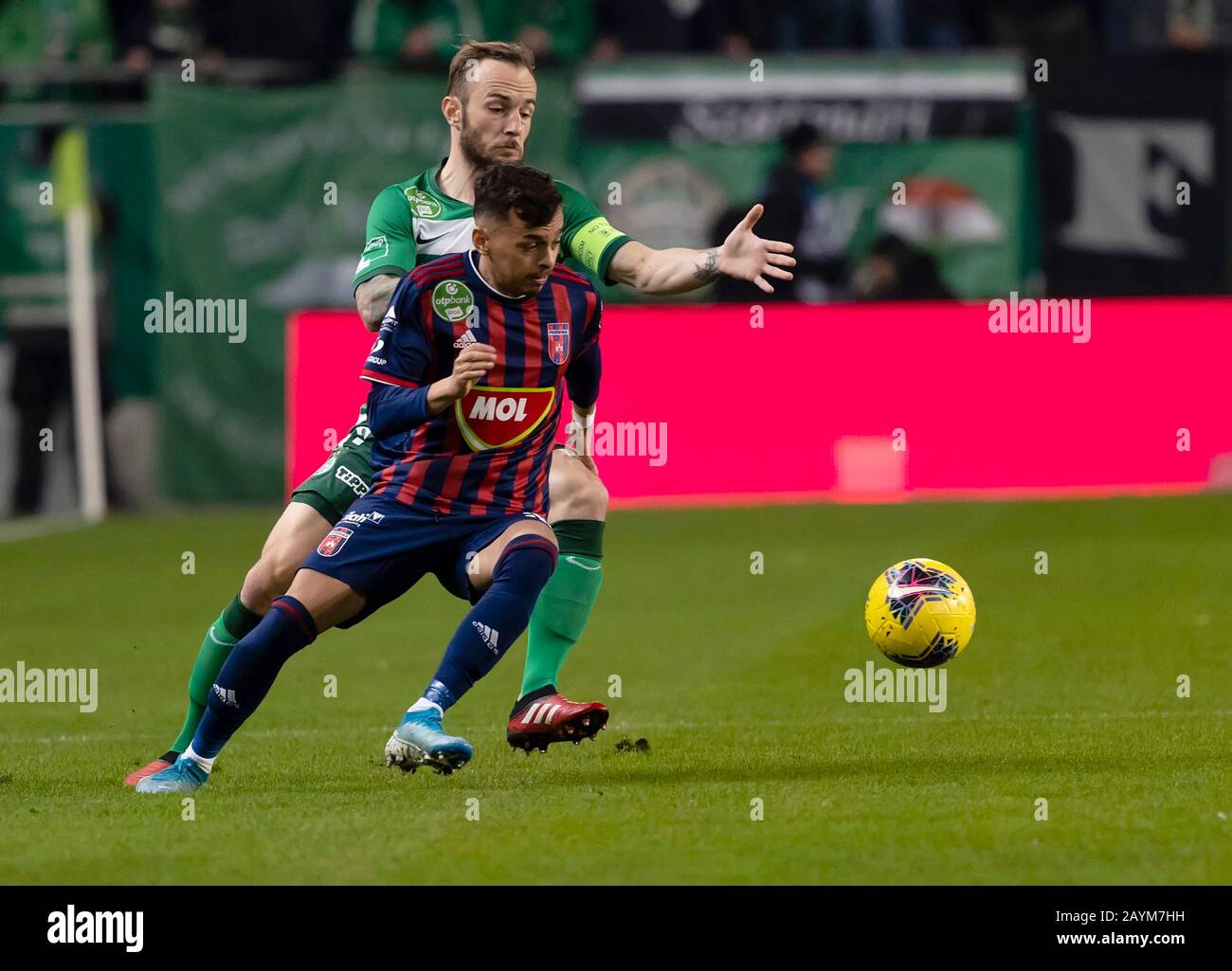 Lyes Houri of MOL Fehervar FC challenges David Siger of