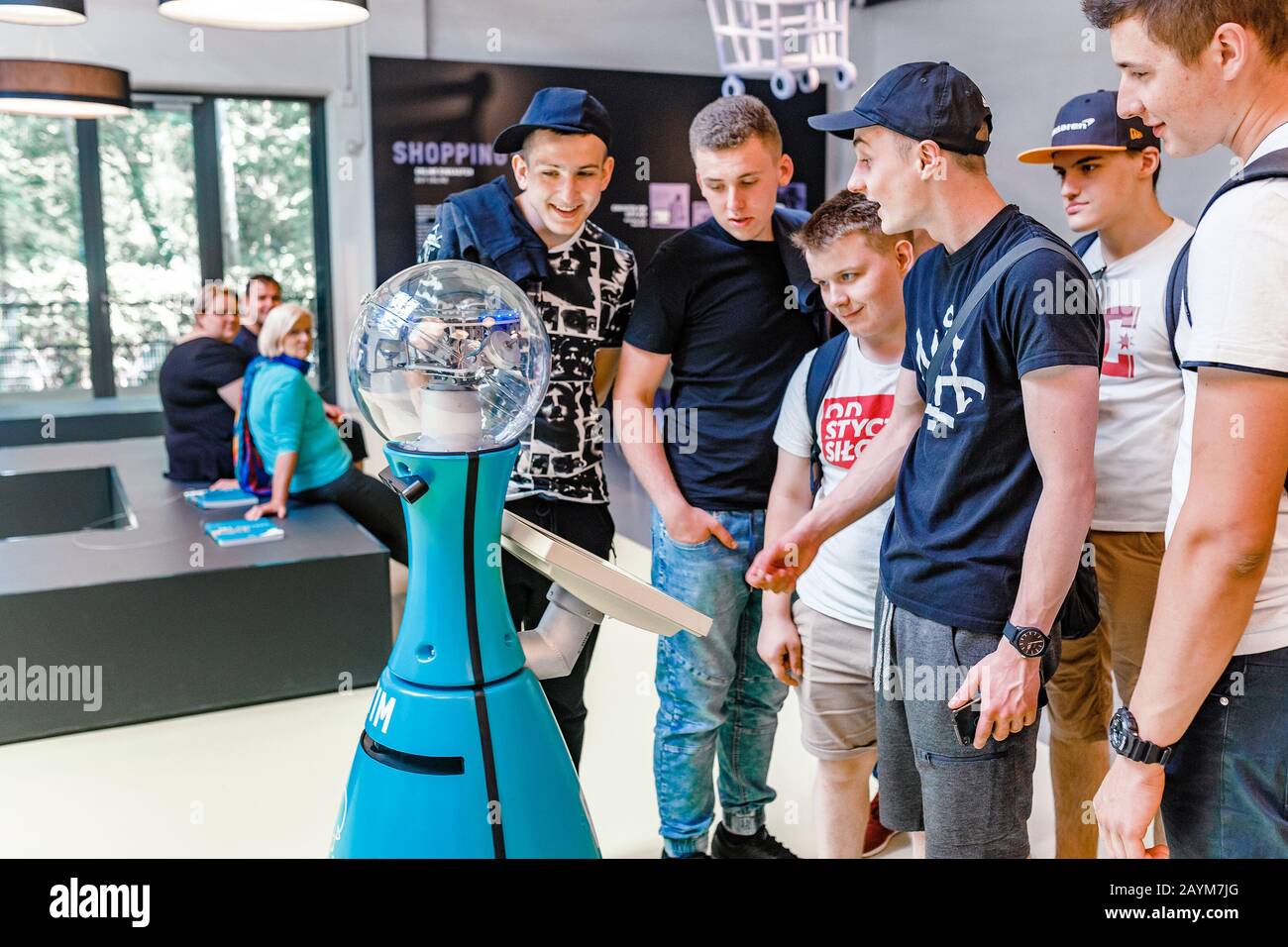 BERLIN, GERMANY - 19 MAY 2018: Visitors interact with Robot assistant guide in the German Technical Museum in Berlin Stock Photo