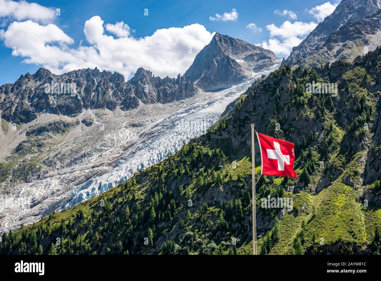 Trient glacier, swiss flag, seen from mountain hut Chalet du Glacier, Valais, Switzerland Stock Photo