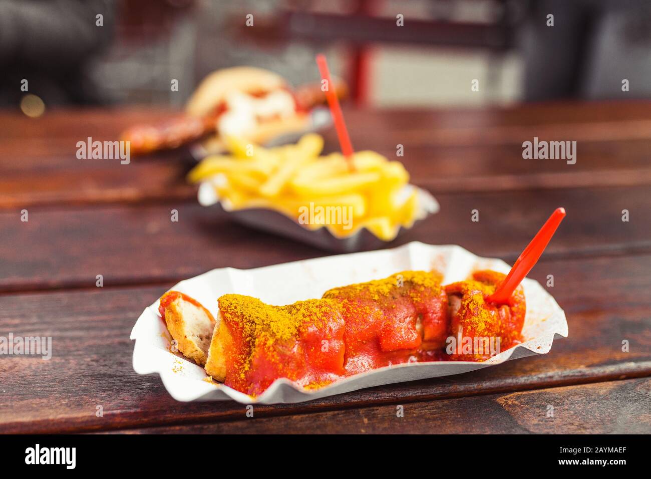 German curry wurst sausage with french fries, street food concept Stock Photo