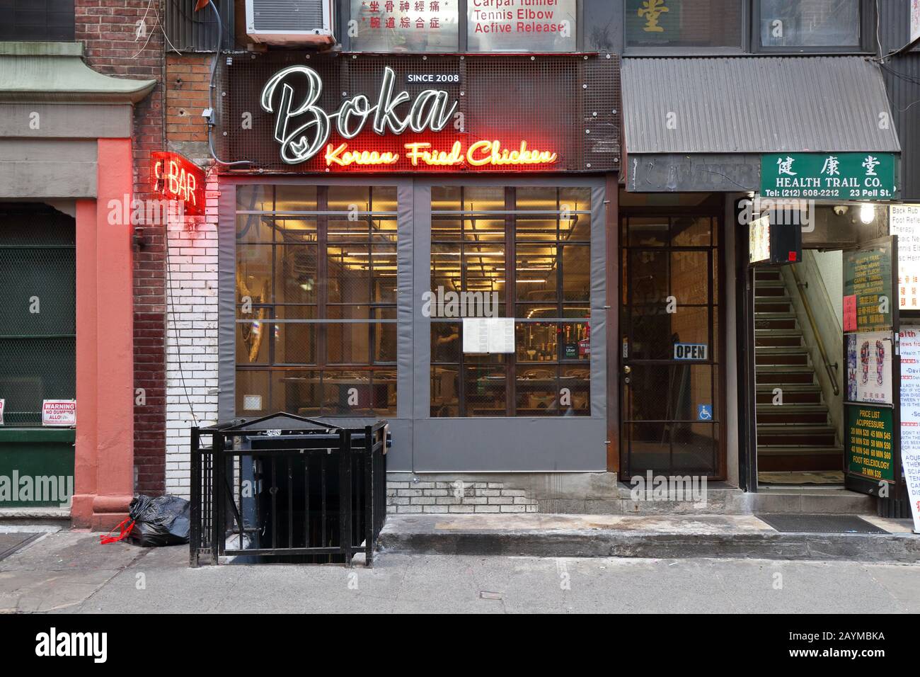 [historical storefront] Boka, 23 Pell St, New York, NYC storefront photo of a Korean fried chicken restaurant and bar in Manhattan Chinatown. Stock Photo