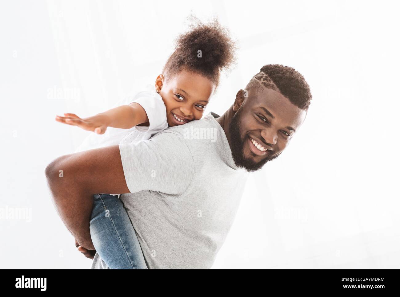 Portrait of happy black family having fun over white backgroud Stock ...