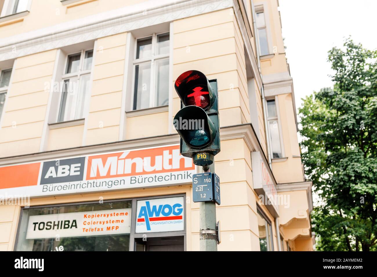16 MAY 2018, BERLIN, GERMANY: pedestrian traffic light showing emblematic Ampelmann man Stock Photo