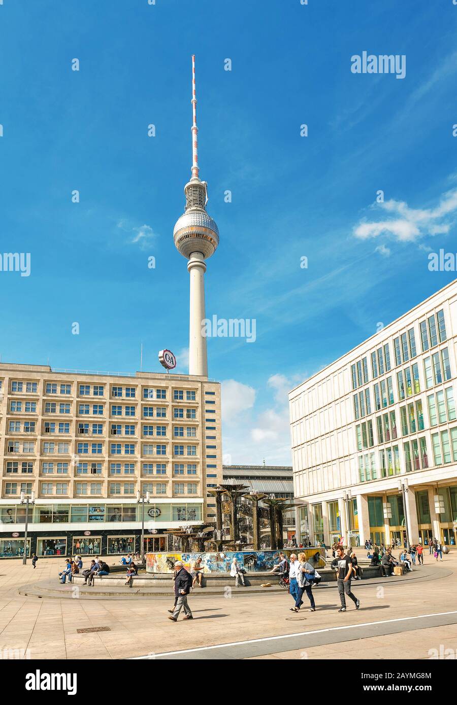 17 MAY 2018, BERLIN, GERMANY: Panoramic view of Alexanderplatz square with famous TV tower and crowds of people Stock Photo