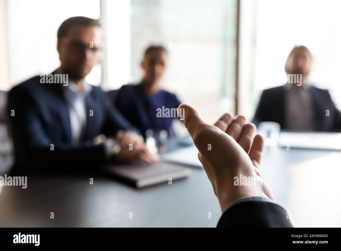 Close up businessman holds out helping hand. Stock Photo